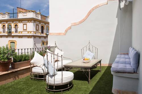 Imagen de los interiores del Apartamentos Maestranza Boutique. Foto 11