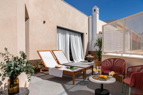 Imagen de la habitación del Apartamentos Magno Apartments Castilla. Foto 15