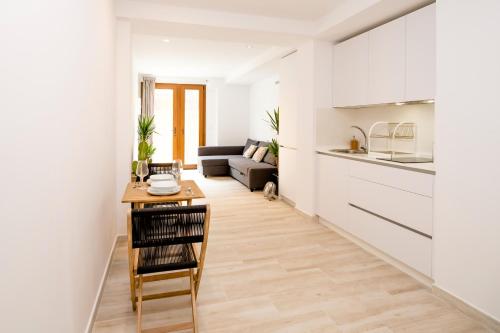 Imagen de la habitación del Apartamentos Malabau Beach House. Foto 16