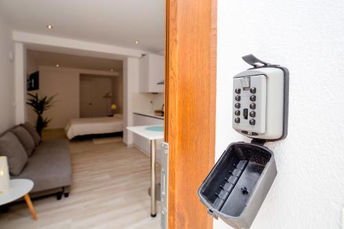 Imagen de la habitación del Apartamentos Malabau Beach House. Foto 17