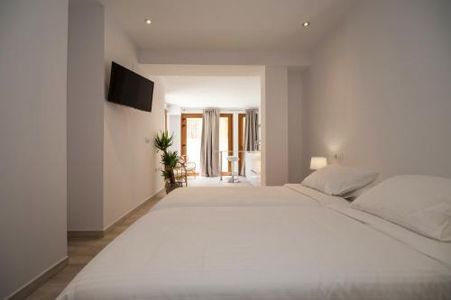 Imagen general del Apartamentos Malabau Beach House. Foto 7