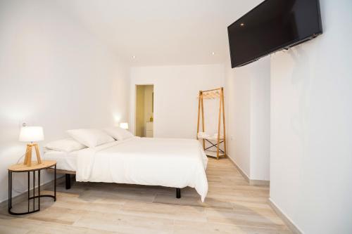 Imagen general del Apartamentos Malabau Beach House. Foto 8