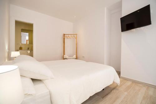Imagen general del Apartamentos Malabau Beach House. Foto 9
