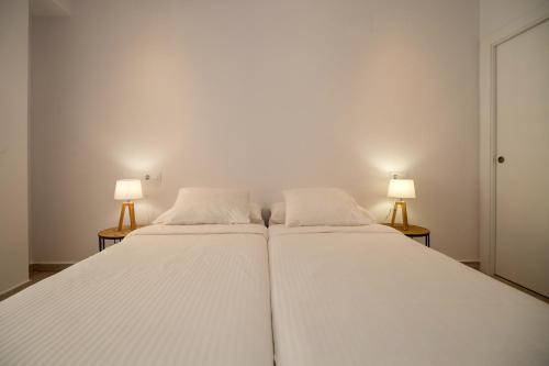 Imagen de la habitación del Apartamentos Malabau Beach House. Foto 20