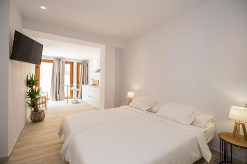 Imagen general del Apartamentos Malabau Beach House. Foto 10