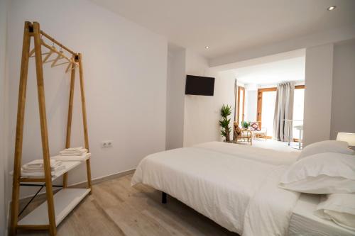 Imagen general del Apartamentos Malabau Beach House. Foto 12
