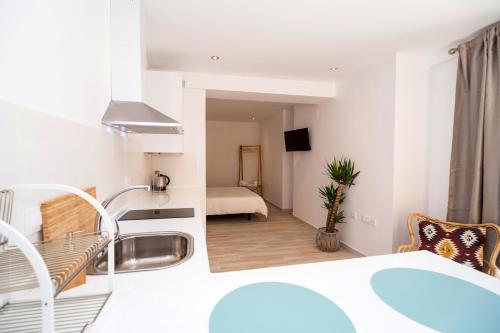 Imagen general del Apartamentos Malabau Beach House. Foto 13