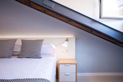 Imagen de la habitación del Apartamentos Malasaña Central Suites. Foto 7