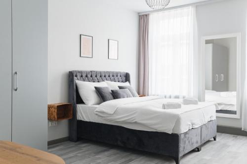 Imagen de la habitación del Apartamentos Malfatti Urban Oasis. Foto 2