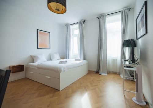 Imagen de la habitación del Apartamentos Malfatti Urban Oasis. Foto 9