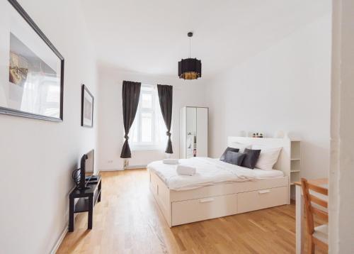 Imagen de la habitación del Apartamentos Malfatti Urban Oasis. Foto 10