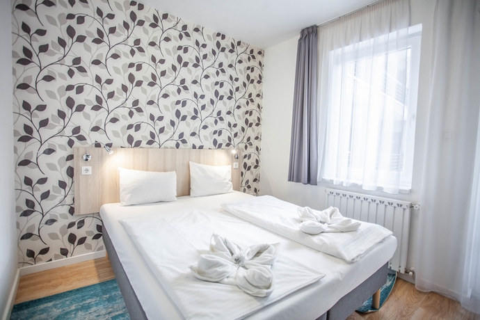 Imagen de la habitación del Apartamentos Maple Tree Apartments. Foto 2