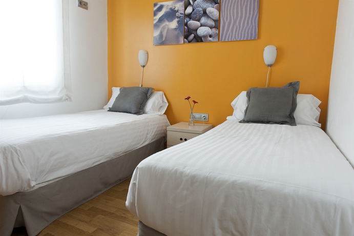 Imagen de la habitación del Apartamentos Mh Apartments S. Familia. Foto 3