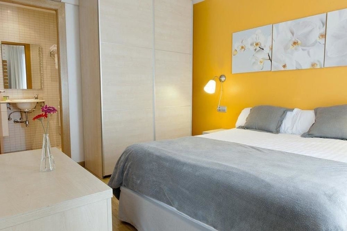 Imagen de la habitación del Apartamentos Mh Apartments S. Familia. Foto 5