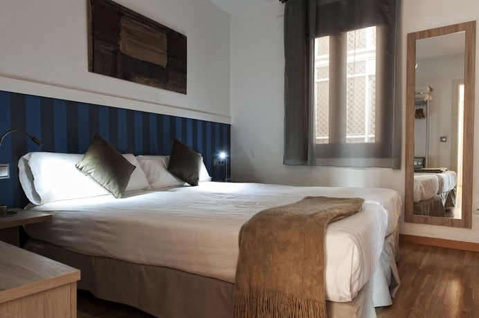 Imagen de la habitación del Apartamentos Mh Liceo. Foto 5