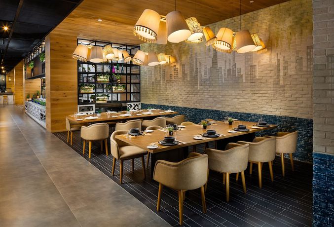 Imagen del bar/restaurante del Apartamentos Millennium Place Mirdif, Mirdif. Foto 4