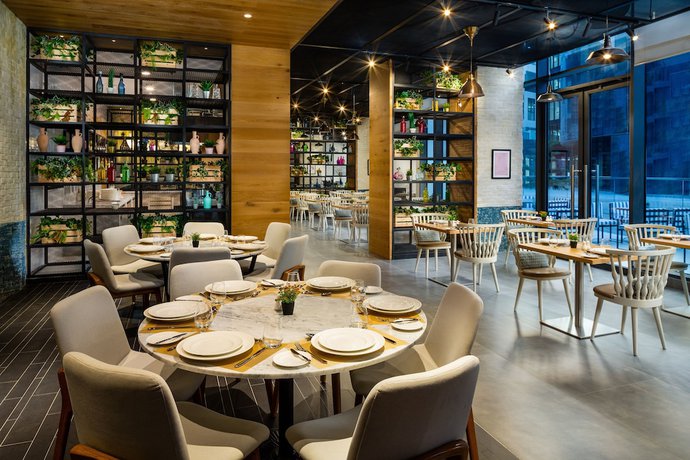 Imagen del bar/restaurante del Apartamentos Millennium Place Mirdif, Mirdif. Foto 6