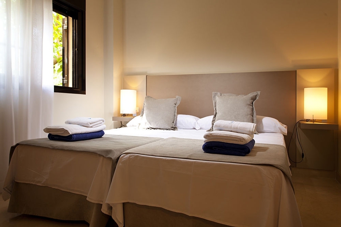 Imagen de la habitación del Apartamentos Mimosas Suites Banús. Foto 11