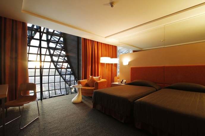 Imagen de la habitación del Apartamentos Miracle Transit Hotel. Foto 2