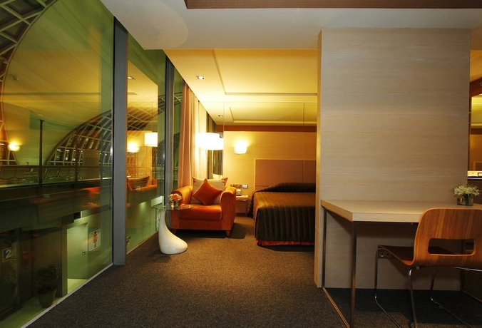 Imagen de la habitación del Apartamentos Miracle Transit Hotel. Foto 3