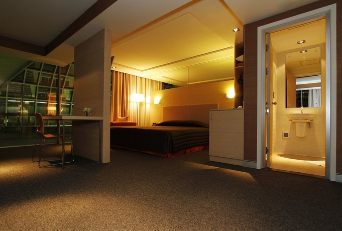 Imagen de la habitación del Apartamentos Miracle Transit Hotel. Foto 12