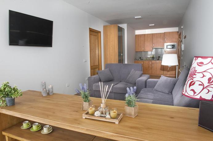 Imagen de la habitación del Apartamentos Miramar Ski a pie de pista. Foto 7