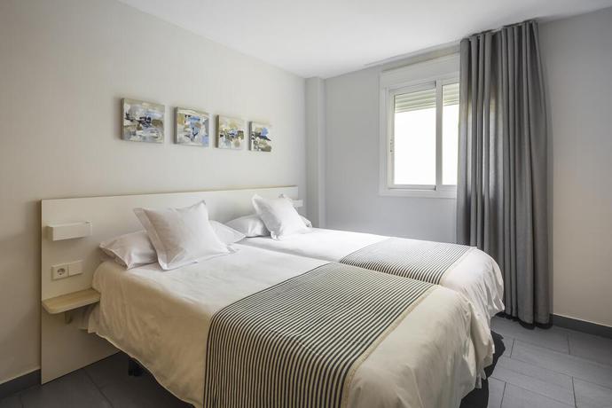 Imagen de la habitación del Apartamentos Mon Suites Carmen. Foto 9