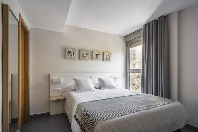 Imagen de la habitación del Apartamentos Mon Suites Carmen. Foto 14