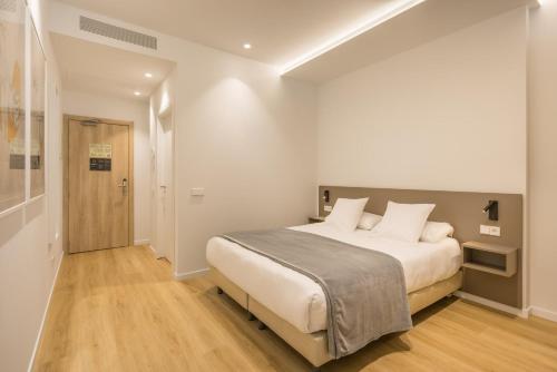 Imagen de la habitación del Apartamentos Mon Suites Jard&iacute;n de Ayora. Foto 18