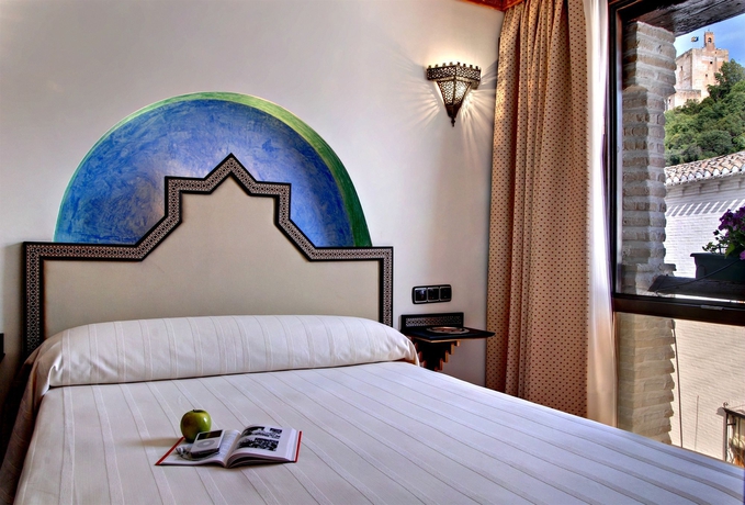 Imagen de la habitación del Apartamentos Muralla Zirí. Foto 1