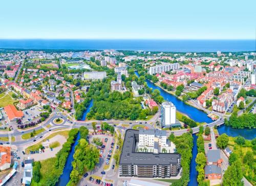 Imagen de la habitación del Apartamentos Młyńska 10 by Apartamenty Nad Parsętą. Foto 19