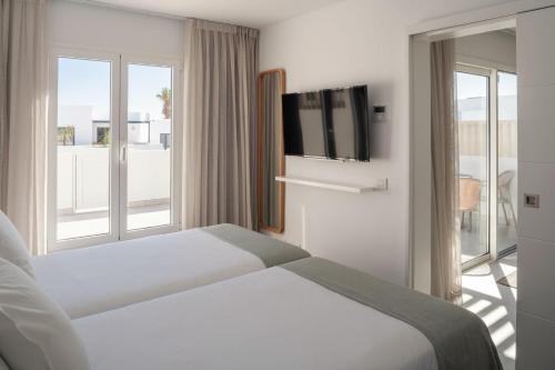 Imagen de la habitación del Apartamentos Nazaret Beach - Adults only. Foto 7