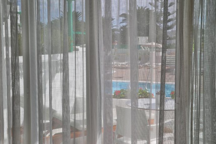 Imagen de la habitación del Apartamentos Nazaret. Foto 17
