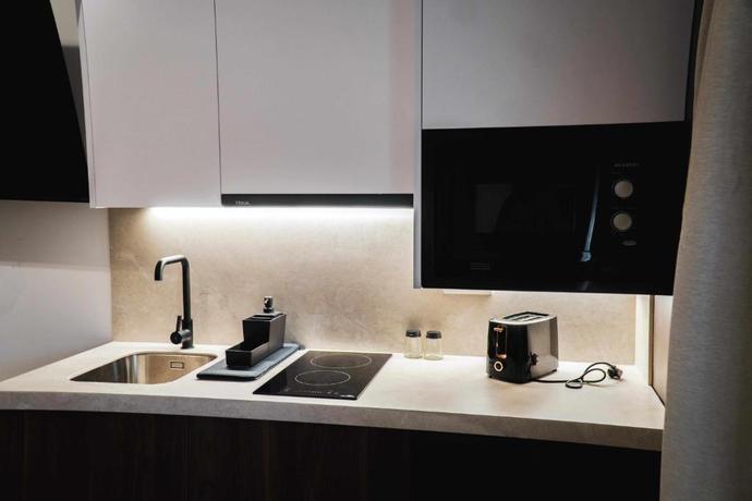 Imagen de la habitación del Apartamentos Nido Baeza Suites. Foto 6