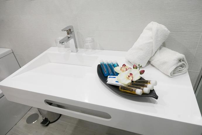 Imagen de la habitación del Apartamentos Ohasis Boutique Suites. Foto 7