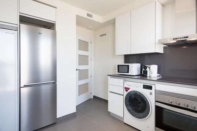 Imagen de la habitación del Apartamentos Olala Port Forum Apartments. Foto 4