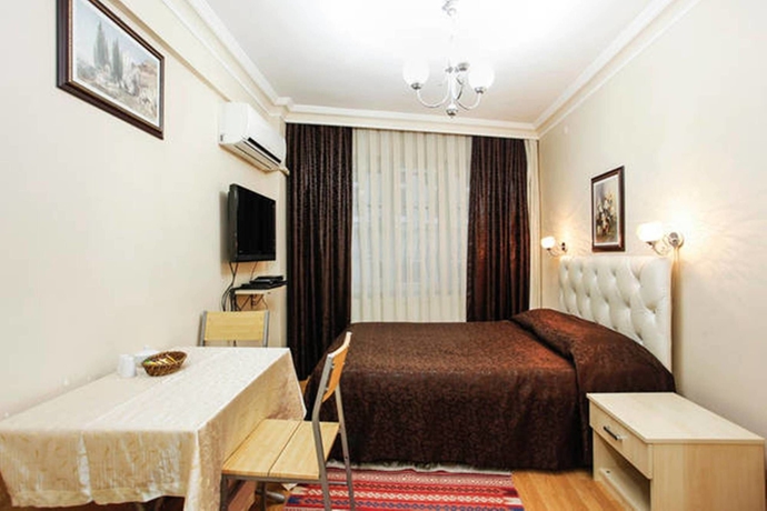 Imagen de la habitación del Apartamentos Old City Teo Apartments. Foto 11