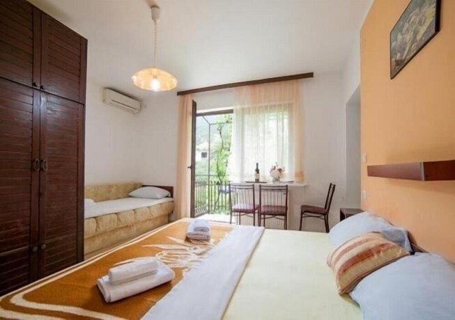 Imagen de la habitación del Apartamentos Olive Garden Apartments Petrovic. Foto 23