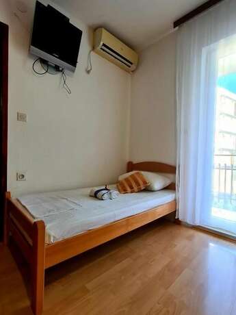 Imagen de la habitación del Apartamentos Olive Garden Apartments Petrovic. Foto 27