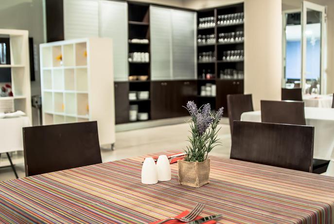 Imagen del bar/restaurante del Apartamentos Ona Ogisaka Garden. Foto 3