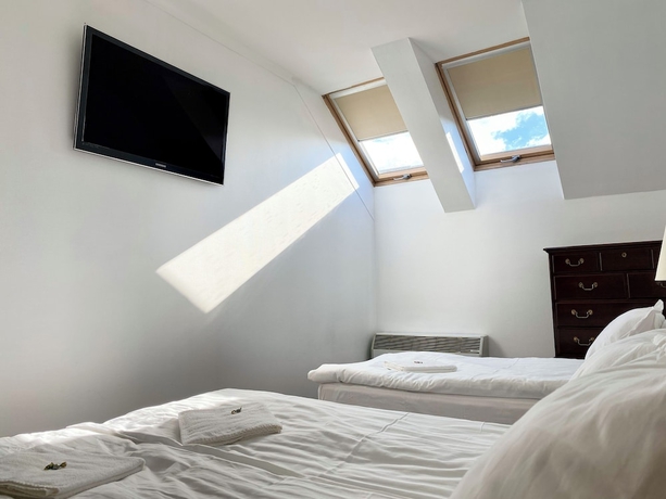 Imagen de la habitación del Apartamentos Opera16 Guestrooms. Foto 10