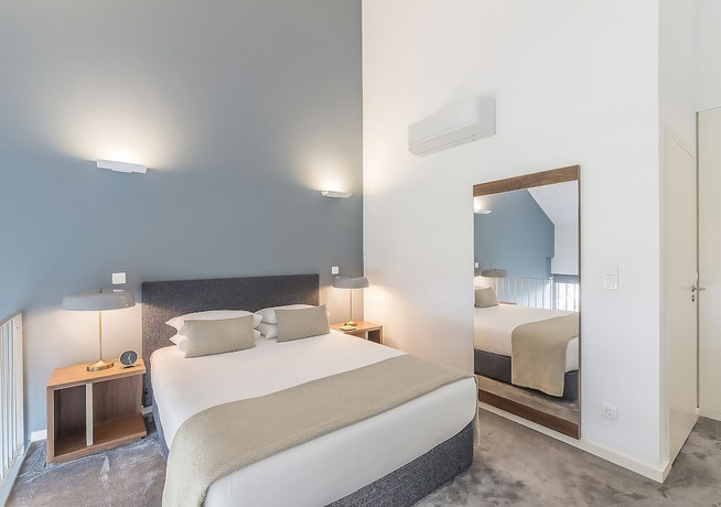 Imagen de la habitación del Apartamentos Oporto Collection Santa Catarina Pool and Fitness - Adults Only. Foto 11