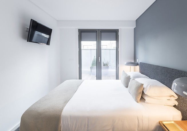 Imagen de la habitación del Apartamentos Oporto Collection Santa Catarina Pool and Fitness - Adults Only. Foto 15