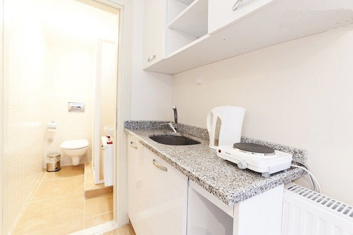 Imagen de la habitación del Apartamentos Ortakoy Suites. Foto 6