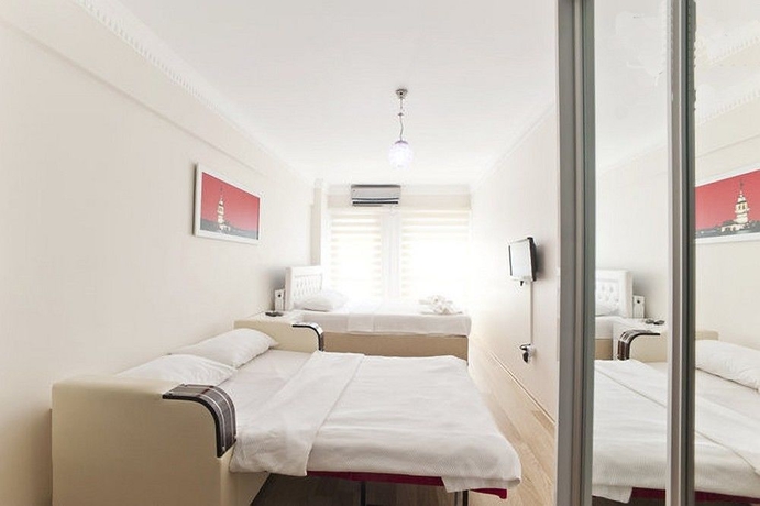 Imagen de la habitación del Apartamentos Ortakoy Suites. Foto 11