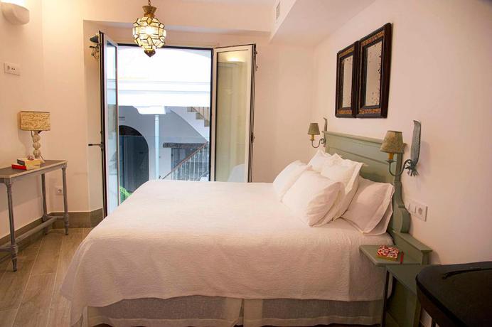 Imagen de la habitación del Apartamentos Overland Suites Catedral. Foto 4