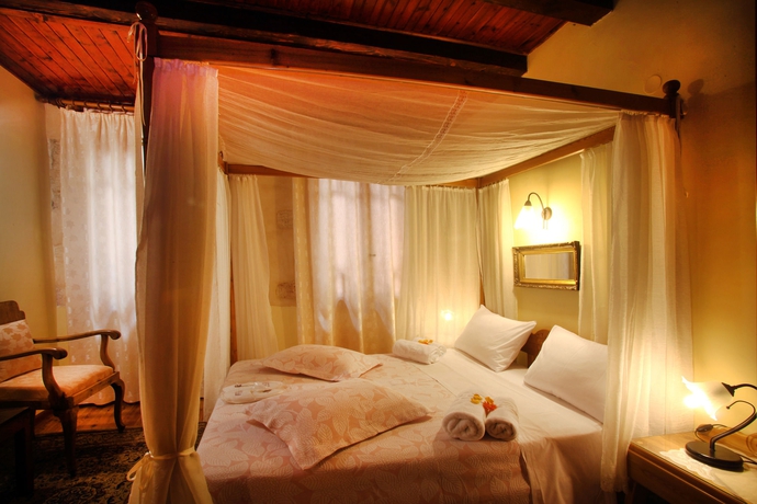 Imagen de la habitación del Apartamentos Palazzo Di Pietro. Foto 2