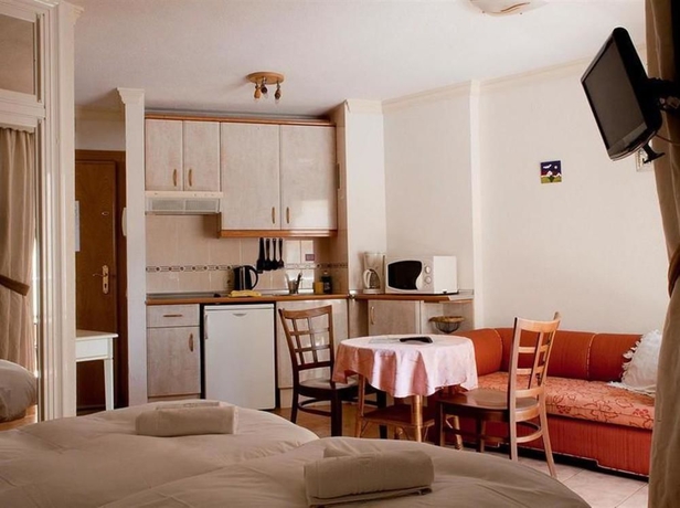 Imagen de la habitación del Apartamentos Palm Beach Club. Foto 7