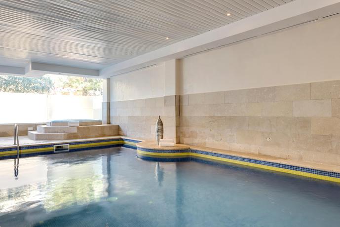 Imagen de la piscina del Apartamentos Palm Garden Apartments. Foto 27