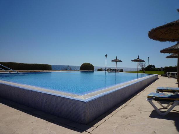Imagen de la piscina del Apartamentos Parquemar, Cala d'Or. Foto 14